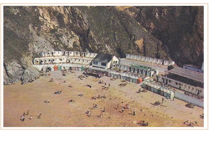Old historical aerial photograph of Lusty Glaze Beach with visitors on the sand